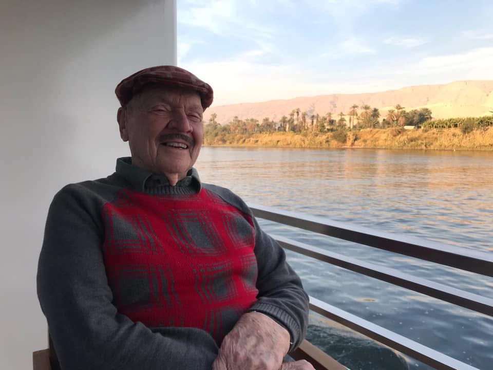 Heather Rim's father smiling by the water